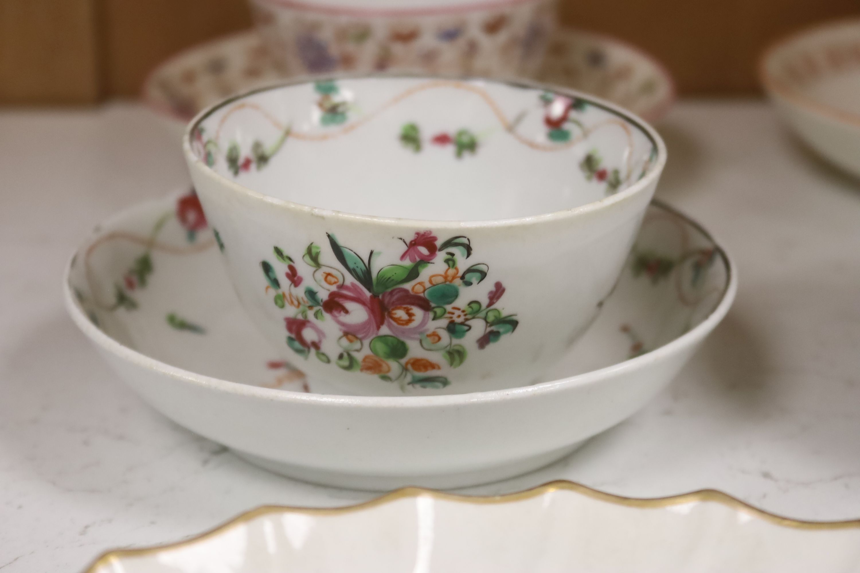 A group of late 18th / early 19th century English porcelain teaware and plates